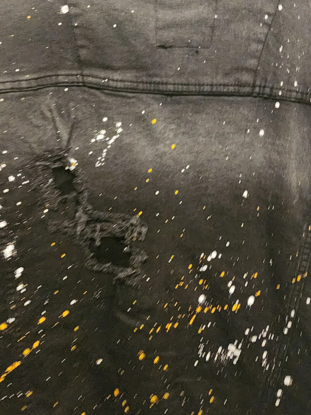 Men's Black Distressed Paint-Splatter Denim Jacket with Yellow Accents